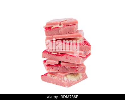 Strawberry angel hair chocolate pieces stacked into a tower, studio shot, isolated on a white background. Stock Photo