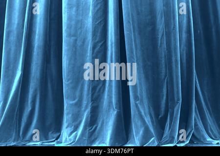Deep Blue Teal Velvet Curtain Background With Vertical Folds Stock Photo