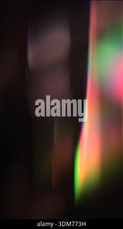Abstract Light Leak - Rainbow Gradient Holographic Prism Effect, Dark Background, 2000s Aesthetic Stock Photo