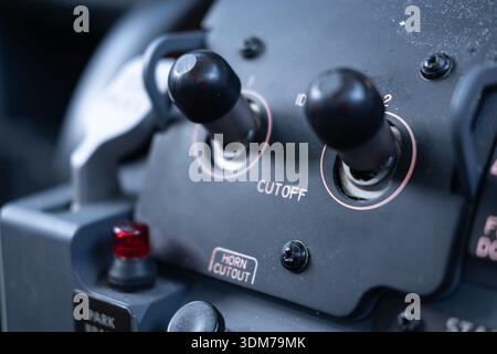 Selective focus close-up of Boeing aircraft cockpit fuel control switches Stock Photo