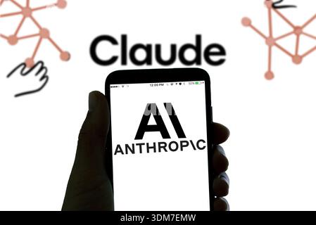 Barcelona, Spain - 4 february 2026: In this photo illustration the logo of the AI company Anthropic, creator of Claude, is seen on the display of a sm Stock Photo