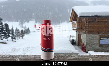 Livigno, Italy - February 3, 2026: Branded Coca Cola volunteer