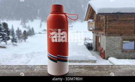 Livigno, Italy - February 3, 2026: Branded Coca Cola volunteer