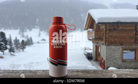 Livigno, Italy - February 3, 2026: Branded Coca Cola volunteer