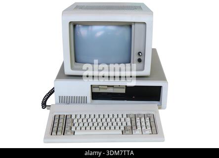 Retro generic desktop computer with CRT monitor, photo isolated on white background. Vintage personal computer. Stock Photo