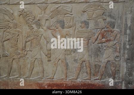 Stone wall with carved ancient Egyptian bas relief Stock Photo - Alamy