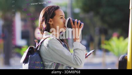 Drinking woman in denim jacket holding phone and coffee cup on sidewalk, backpack with code overlay Stock Photo
