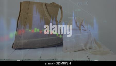 Displaying large tan canvas tote and small cream tote sitting on white painted plank, chart overlay Stock Photo