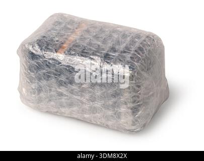 Parcel wrapped in transparent air bubble cushioning material for safe delivery Stock Photo