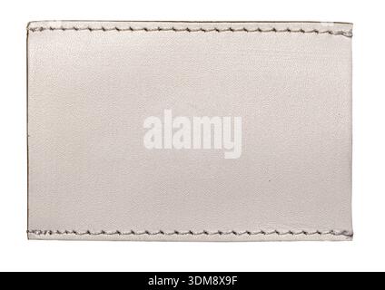 Blank light colored leather tag with white stitching, isolated on a transparent background Stock Photo