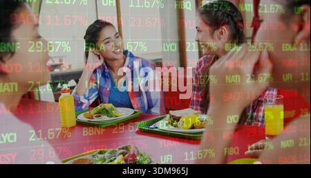 Chatting teens in plaid shirts leaning, gesturing in lunchroom, with green trays and ticker overlay Stock Photo