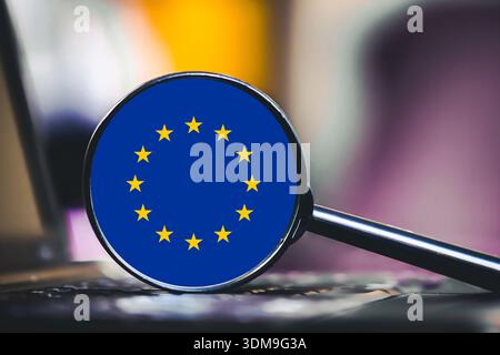 European Union symbol near laptop keyboard closeup. Digital technology and cybersecurity concept with european online communication theme. Stock Photo
