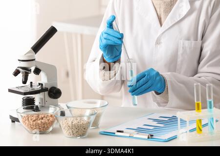 Scientist testing products in laboratory. HACCP concept Stock Photo