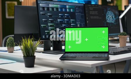 Isolated screen laptop used in company workplace for artificial intelligence tech quality assurance. Mockup notebook in empty office used to write AI script with programming languages Stock Photo