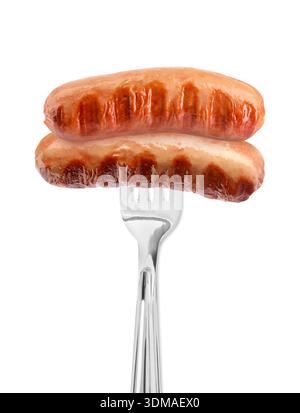 Grilled sausages on fork against white background Stock Photo