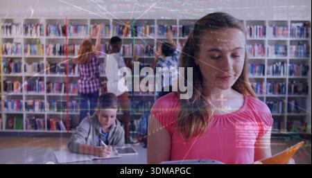 Reading teen in bright pink top holding orange folder at school library, bookshelves, copy space Stock Photo