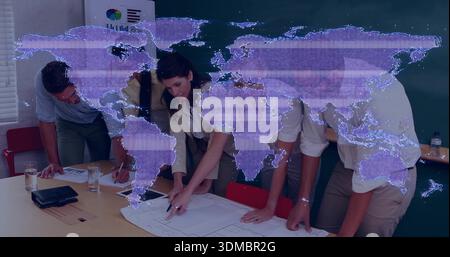 Leaning five-person team in business casual reviewing blueprints at meeting table, holographic map Stock Photo