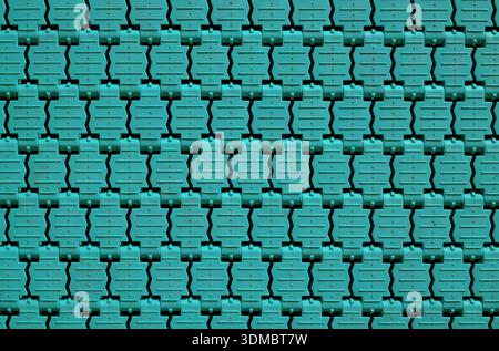 Close-up of the aquamarine colored texture of the ground trampoline for children Stock Photo