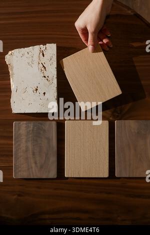 Natural Wood and Travertine Stone Samples – Luxury Artisan Furniture Materials and Interior Design Concept Stock Photo