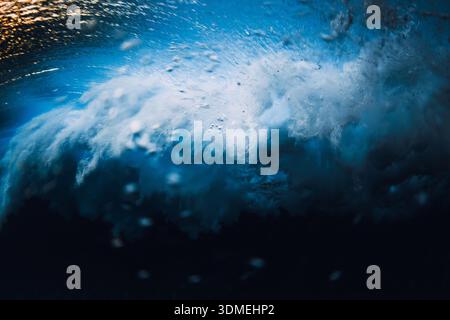 Powerful ocean wave underwater with bubbles and motion, abstract sea energy and natural water texture Stock Photo