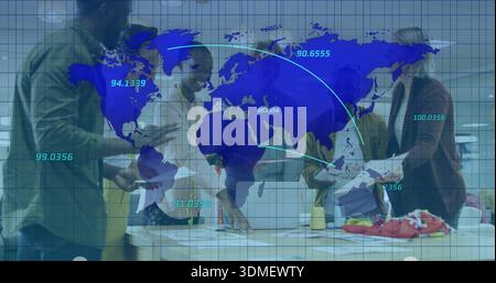 Leaning team in casual attire examining sketches, swatches at office table with tablet, map overlay Stock Photo