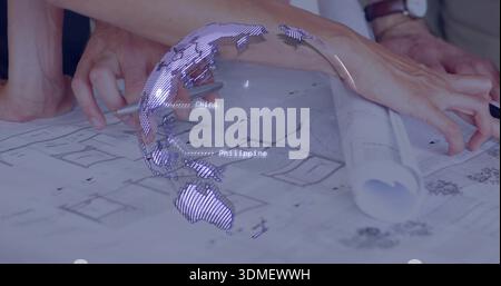 Pointing two hands in rolled sleeves tracing plans on studio table, with rolled plan, digital globe Stock Photo