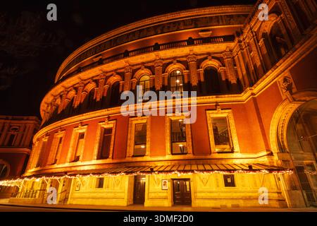 England, London, Westminster, Kensington and Chelsea, Knightsbridge, Exterior View of Royal Albert Hall Illuminated at Night Stock Photo