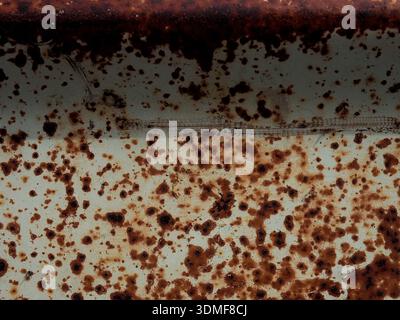 Rusty surface with exfoliated paint in gray using as background Stock Photo