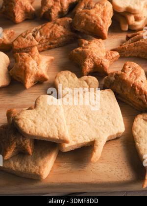 Tasty Christmas cookies on a wooden table, sweet seasonal food, Christmas bakery Stock Photo
