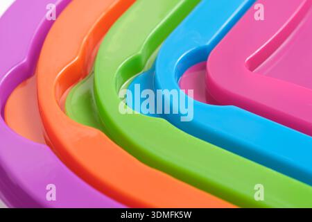 Abstract macro background of colorful plastic surfaces and geometric lines Stock Photo