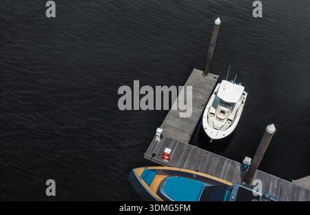 High angle view of two boats docked at marina Stock Photo