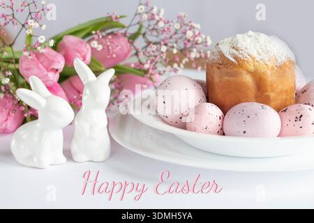 Festive Easter Composition: Kulich Bread, Bunny, Eggs and Floral Decor Stock Photo