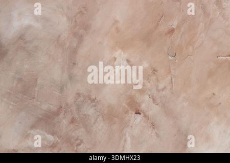 Beige Tan Concrete Wall Texture Background with Weathered Rough Surface Pattern Copy Space Stock Photo