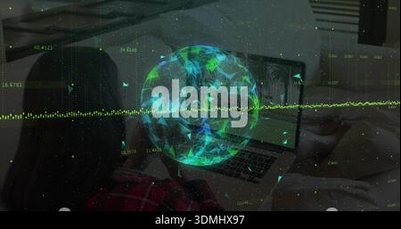 Working woman in red plaid shirt seated on bed facing laptop in bedroom, with holographic data Stock Photo