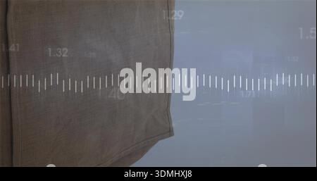 Showing large woven brown fabric panel draping in studio, hem seam grey wall waveform codes scuffs Stock Photo