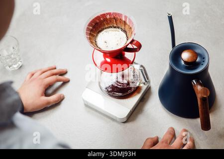 Preparing Fresh V60 Drip Coffee on Counter in Modern Kitchen Setting Stock Photo