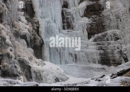 Frozen Waterfall Draped in Winter Ice Stock Photo
