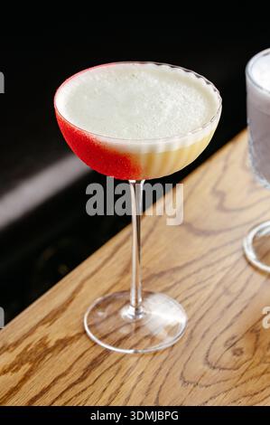 alcoholic cocktail with foam in a beautiful glass Stock Photo