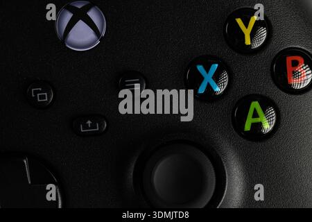 Lviv, Ukraine - February 2, 2026: Macro Shot Of Black Game Controller Buttons With Colorful Action Icons Stock Photo