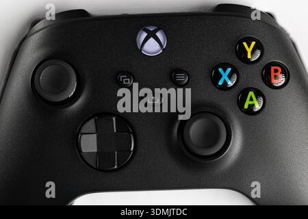 Lviv, Ukraine - February 2, 2026: Macro Shot Of Black Game Controller Buttons With Colorful Action Icons Stock Photo