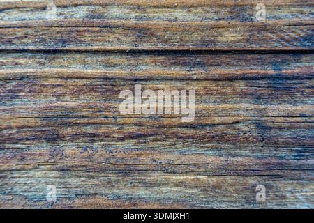 Close up of horizontal wooden boards showing natural grain and signs of wear. Stock Photo