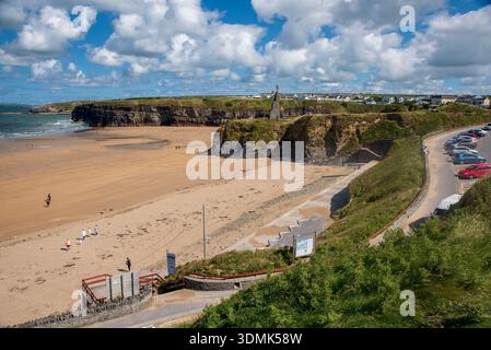 Ballybunion Beach with the ruins of Ballybunion Castle on a cliff overlooking the Atlantic coast, County Kerry, Ireland. Stock Photo