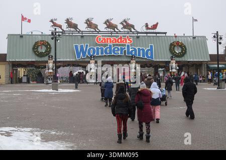 Toronto, ON, Canada - December 31, 2025: Crowds entering Canada's Wonderland amusement park during WinterFest, enjoying the holiday decorations and wi Stock Photo