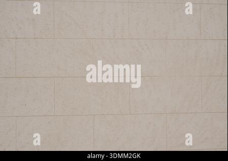 neutral textured tile backdrop, versatile natural stone wall surface suitable for interior design Stock Photo