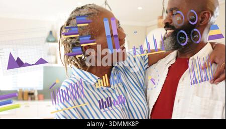 Standing couple embracing in home kitchen, wearing red tee and blue striped shirt, data overlays Stock Photo
