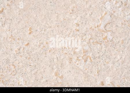 Background of natural beige travertine or limestone stone. Seamless texture with warm tones for architectural design and 3D rendering Stock Photo