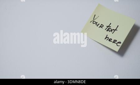 Sticky note your text here mockup on white background copy space Stock Photo