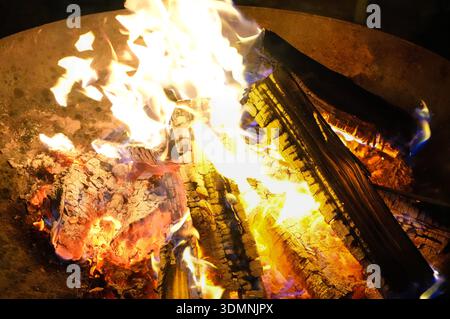 firewood burning in the fire, closeup of photo with fire Stock Photo