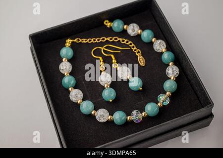 bracelet with natural stones on black background Stock Photo