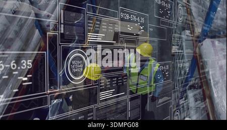 Standing two staff wearing hard hats and vests checking inventory in warehouse aisle, HUD overlay Stock Photo
